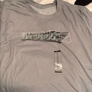 Brand new nike dri fit tee